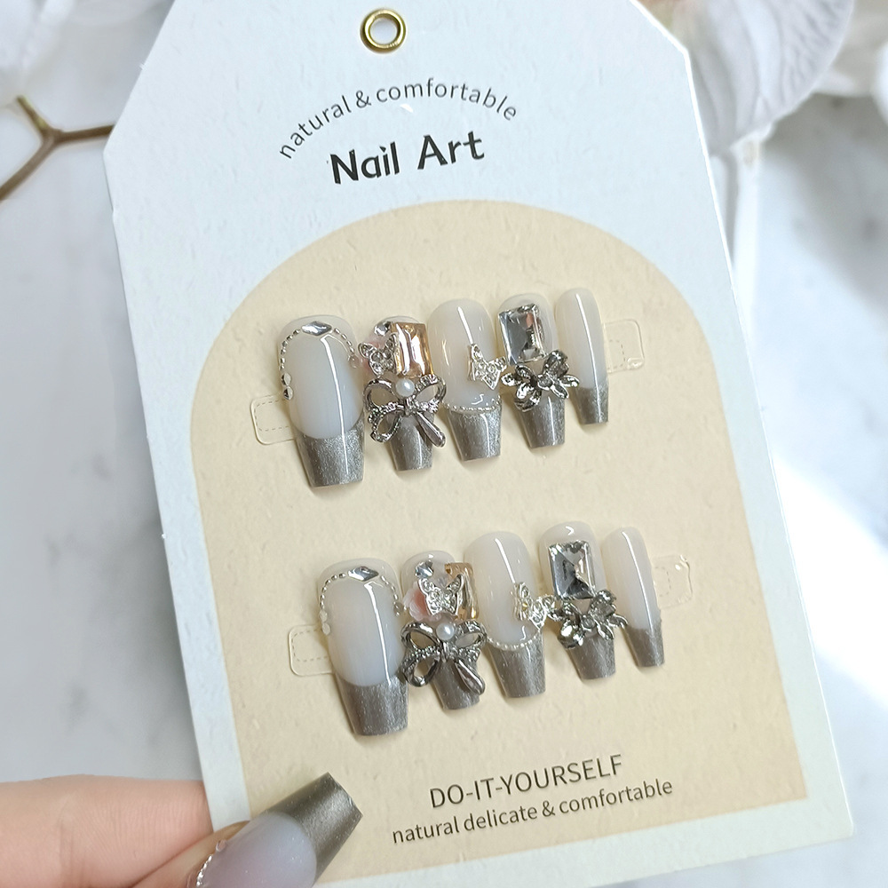 Manicura de Año Nuevo, 10 piezas de diamantes de perlas hechos a mano, arte de uñas portátil, parche de uñas Xiaohongshu, venta al por mayor