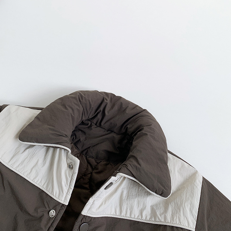 Hombres y niñas de algodón 2025 invierno nuevo chaqueta de algodón para niños coreano engrosado calentamiento ropa superior de niños al por mayor