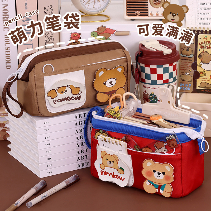 Nuevos productos de la temporada escolar estuche para lápices de alambre de acero estilo ins de dibujos animados lindo estuche para lápices de papelería de gran capacidad para niñas de alto valor