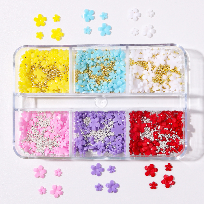 Set de joyas de manicuría de cinco pétalos colorido parches de uñas de flores tridimensionales DIY nail decoración taladro plano al por mayor