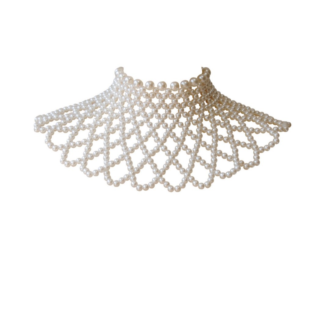 Joyería transfronteriza europea y americana venta caliente verano bohemio cadena de cuerpo señoras cadena de pecho de perla de imitación tejida a mano
