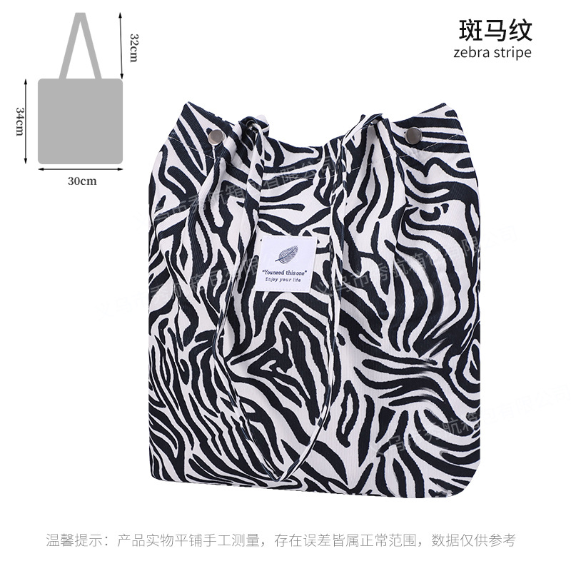 Bolso de lona de pana simple estilo ins Bolso de lona con doble hombro Bolso de almacenamiento de viaje Bolso femenino Bolso de hombro