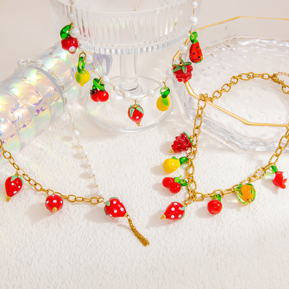 17g Weight PVD Coated Gold Plating Process 18K Gold Plated Plating Material Glass, Titanium Steel Pendant Material Pendant Necklace Classification Titanium Steel Chain Material Beaded Chain, Paperclip Chain, cable chain Chain Type 1 Piece Quantity Casual, Daily Occasion Glass, Titanium Steel Material Cherry, Heart Shape, Strawberry Pattern Women's Gender Plating Design Cute Style Gold Color Cute Cherry Heart Shape Strawberry 18K Gold Plated PVD Coated Glass Titanium Steel Beaded Chain Paperclip Chain Cable Chain Pendant Necklaces Wholesale 6