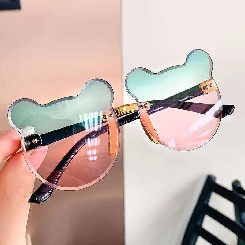 Nuevo oso gafas de sol de los niños raqueta de calle vanguardia moda calle raqueta copia pieza sin marco chica gafas de sol fábrica al por mayor