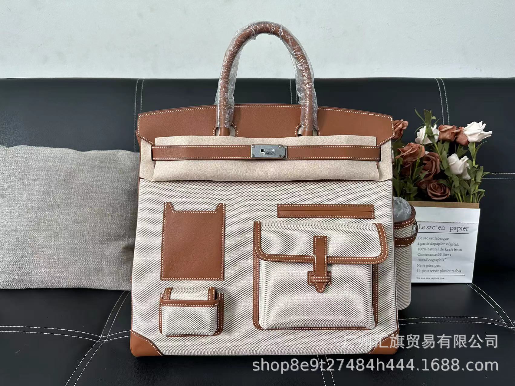 Bolsa de platino directa de fábrica Hac40 bolsas de viaje de color blanco y negro de gran capacidad pulsera de cuero de vaca real de hilo portátil