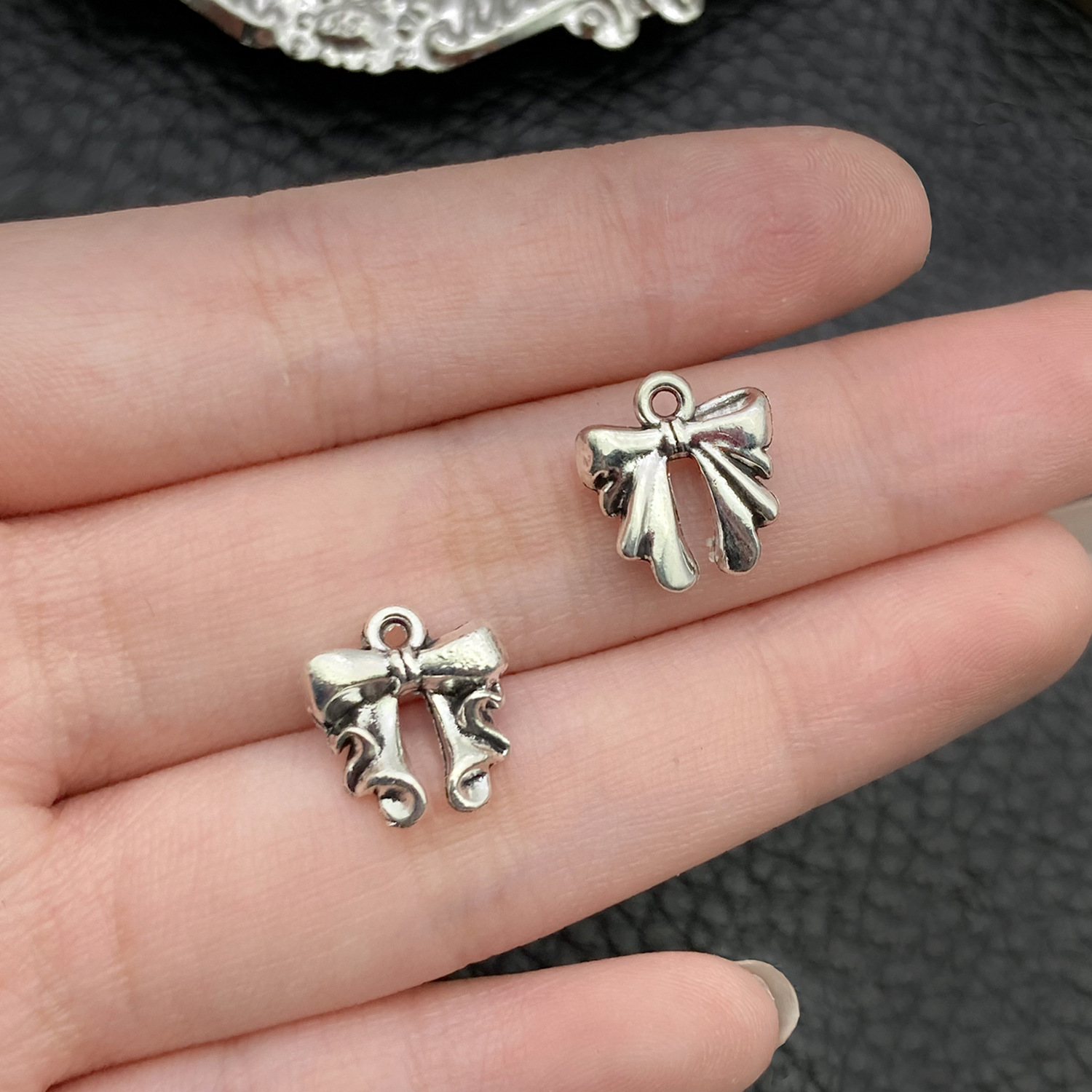 19432-M-古银锌合金绑带波浪蝴蝶结13x11mm-1g