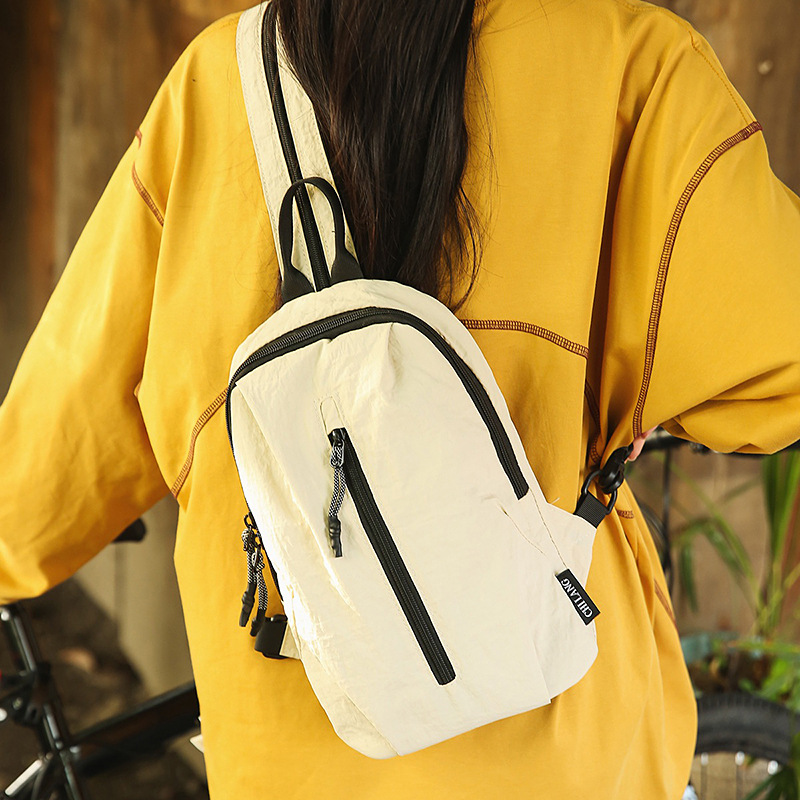 Nuevo estilo pequeño y fresco bolso de mensajero de pareja para hombres y mujeres, mochila de moda simple, mochila de ocio al aire libre de ciclismo multifuncional