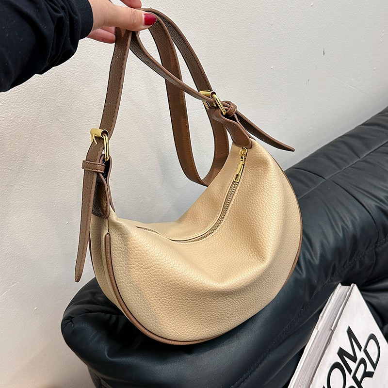 New dumpling bag in solid color faux leather, simple and stylish crossbody bag for women, lychee pattern women's crossbody bag