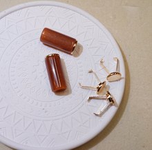 前黄琥珀纹树脂金属束绳扣 衣帽抽绳止绳扣 服装装饰绳头