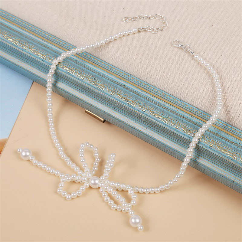 Korean Cute Pearl Bow Necklace display picture 4