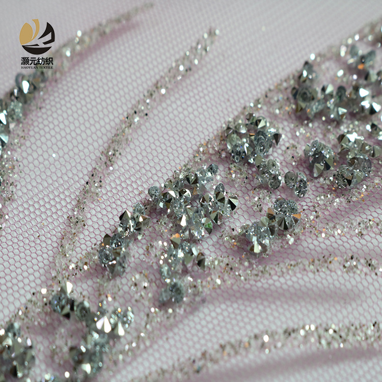 Fabricantes de suministro de tecnología de diamante de poliéster brillante polvo fino tela de malla de diamante vestido tela de boda