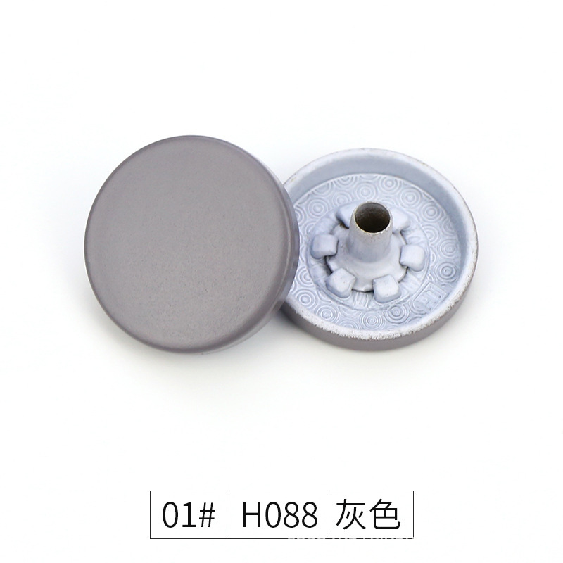 Hebilla de metal de cuatro piezas Botón de panel plano de color chaqueta acolchada de algodón hebilla de superficie de pintura hebilla de cuatro piezas de aleación