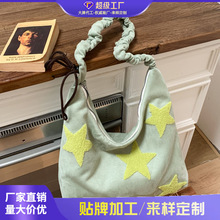 跨境韩系小众星星2026春季轻便大容量购物袋休闲饺子包单肩斜挎包