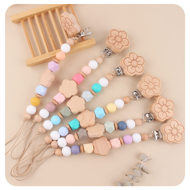 Productos para bebés flores de beech chupeta clips de dibujos animados para bebés flores de beech mordida de dientes molares chupeta cadena de prevención