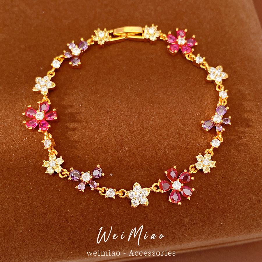 Oro verdadero, pulseras de arco de flores de piedra, pulseras de nicho lujosas, exquisitas joyas de moda al por mayor.