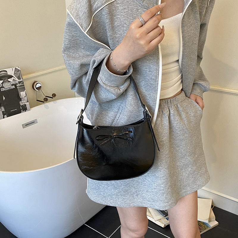 Nicho coreano de lujo ligero arco brazo bolso para mujeres 2025 nuevo estilo versátil bolso de hombro de estilo extranjero bolso de moda