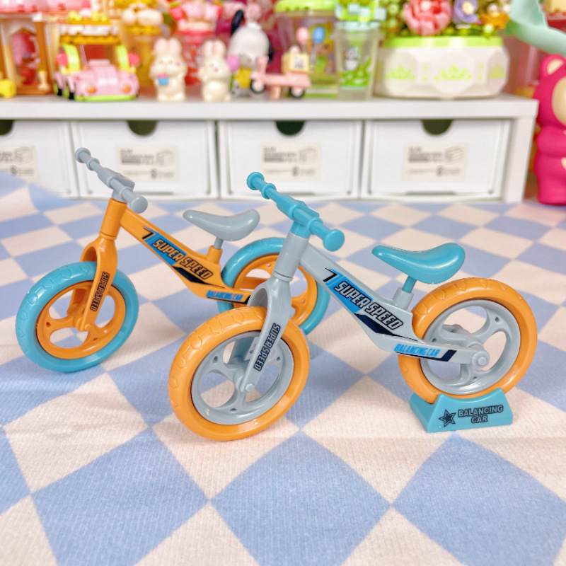 Wholesale creative toys can be movable sliding bicycle couple jewelry key chain hanging ornaments boutique ornaments