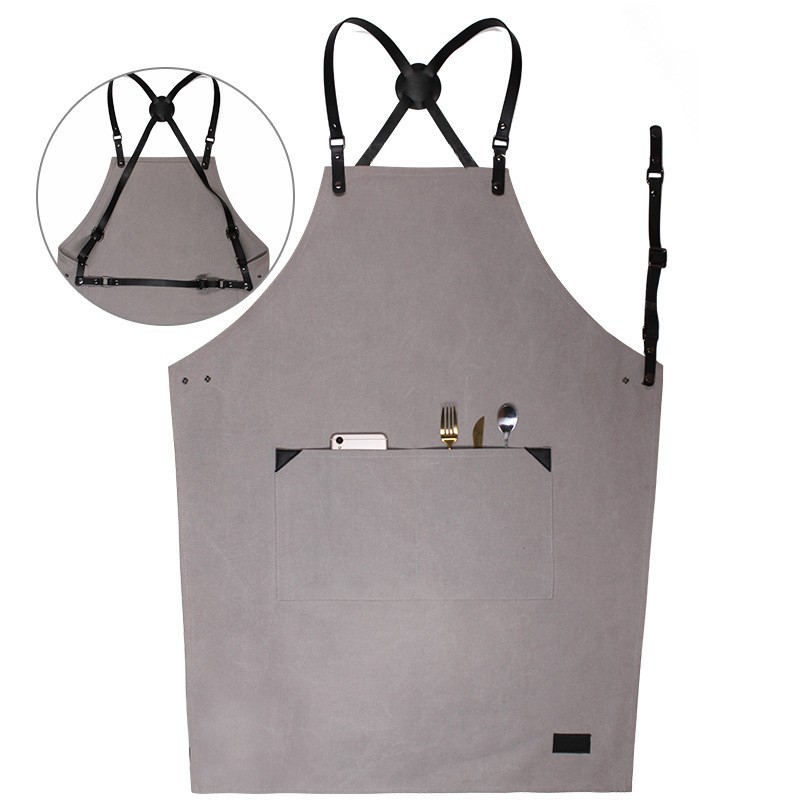 Comercio exterior delantal de lona gruesa peluquería cafetería panadería ropa de trabajo PU cuero correa ajustable delantal al por mayor