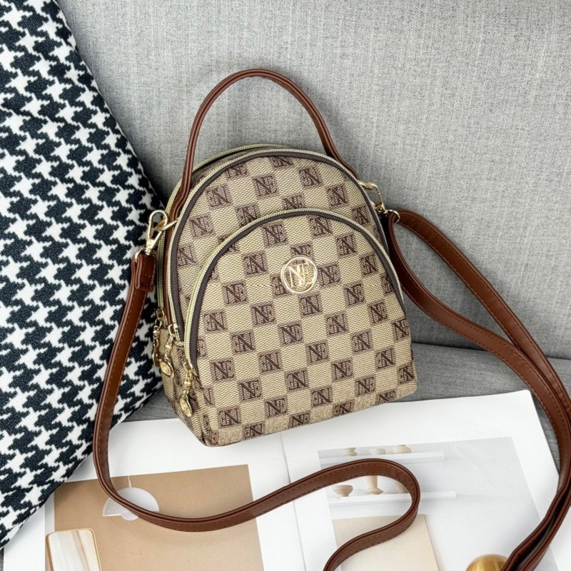 Guangzhou Hengli 2024 nueva moda mochila pequeña bolso de mano bolso de teléfono móvil madre de mediana edad bolso de mensajero de tres usar