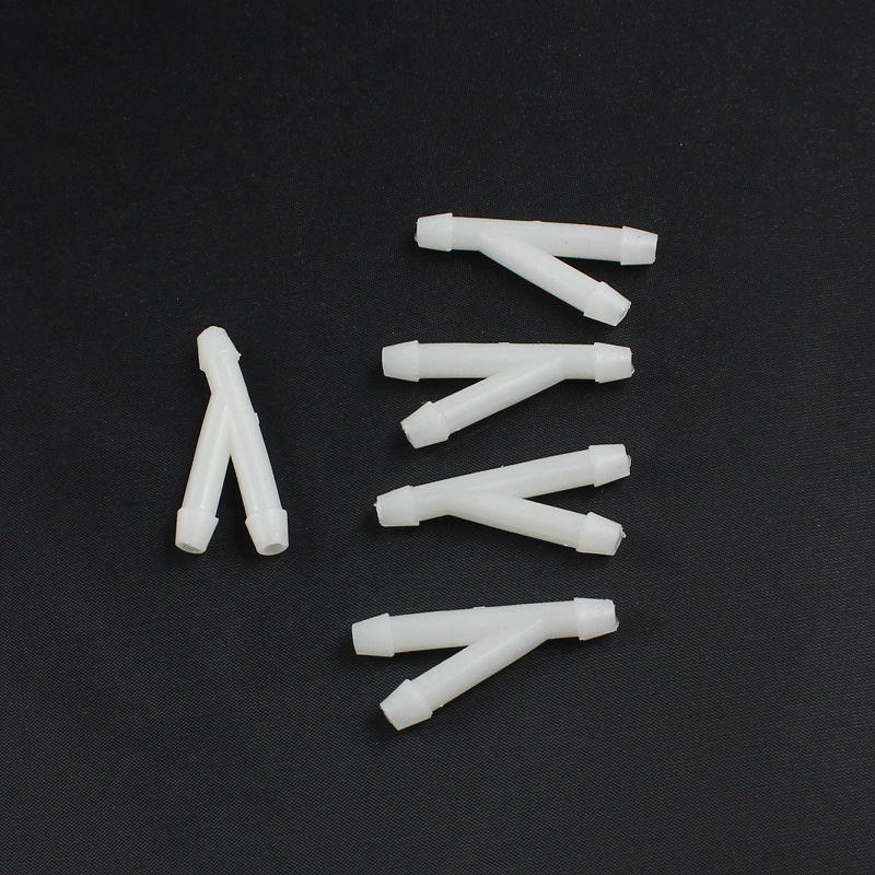 Accesorios de coche conector de tubería de pulverización de agua de limpiaparabrisas de coche universal recto a través de la cabeza de la tubería de pulverización de agua del limpiaparabrisas W02