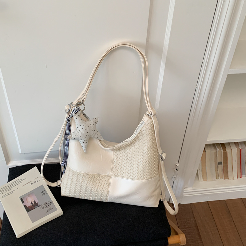 Bolsa multipropósito de gran capacidad para mujeres verano 2026 nueva moda empalme mochila de hombro de viaje bolsa de ocio