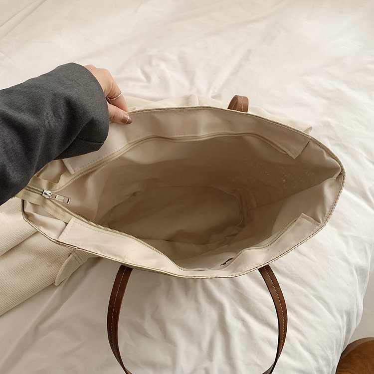 Large capacity tote new high-end single shoulder grass woven women's bag, portable seaside vacation beach bag_voghion.com