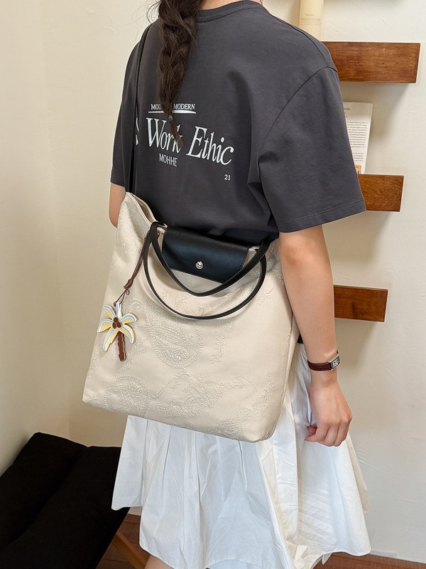 Bolso de mujer 2026 nuevo estilo coreano tela de gran capacidad bolso de mano de viaje simple diario mochila de hombro