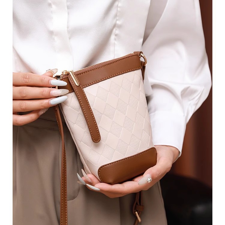 Primavera y verano mini bolso de balde de mujer 2026 nuevo estilo este año popular bolso de mochila versátil bolso de teléfono móvil bolso pequeño