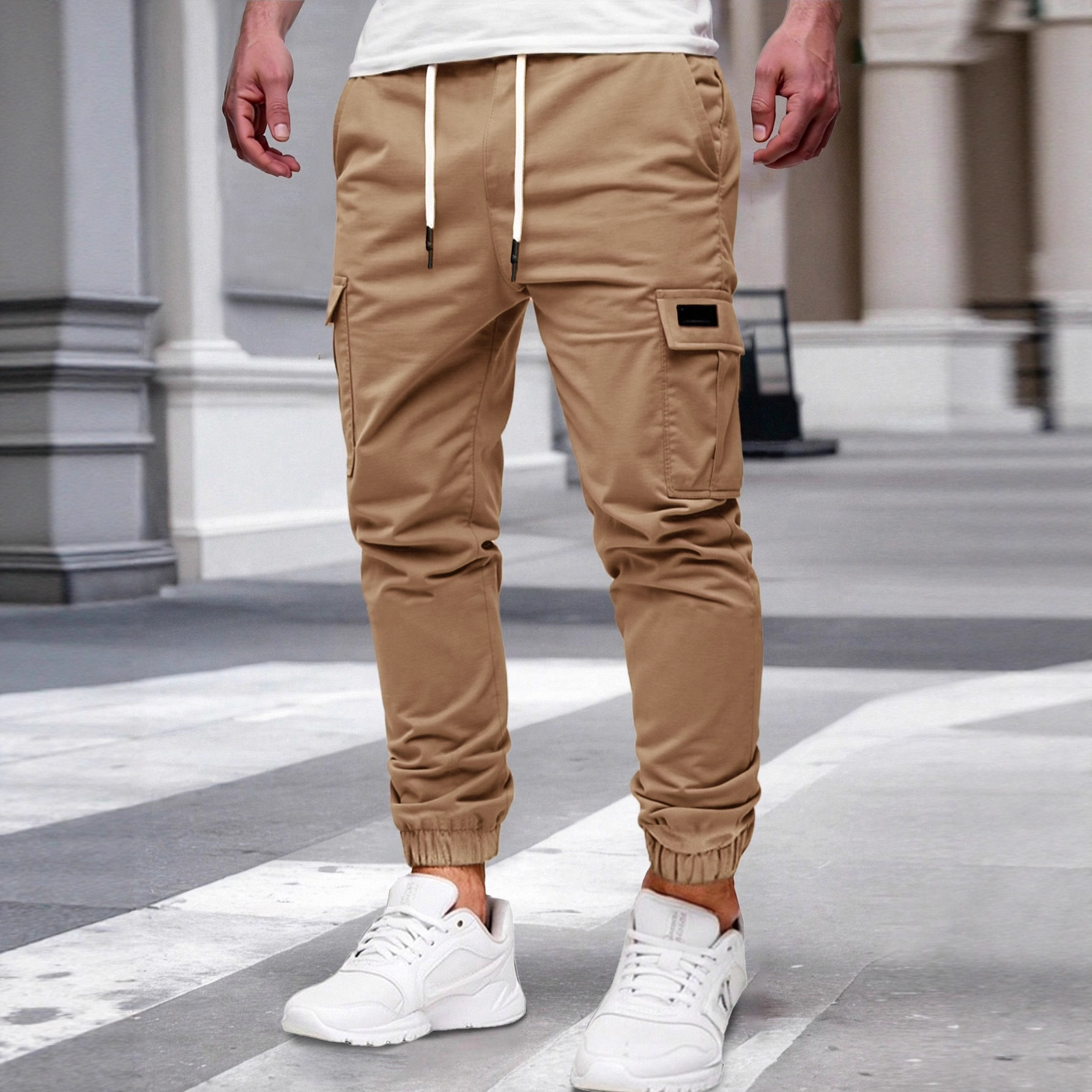 Nuevos pantalones de estilo europeo transfronterizo de hombre de bolsillo multi-bolsillo, pantalones de estilo de moda de comercio exterior.
