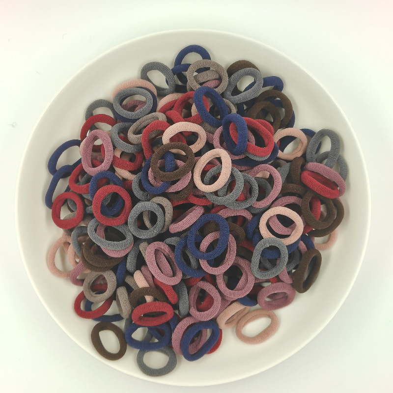 Color de caramelo de alta elasticidad pequeña toalla anillo de cabello bebé anillo de cabello no daña cabello atado fábrica de cabello al por mayor