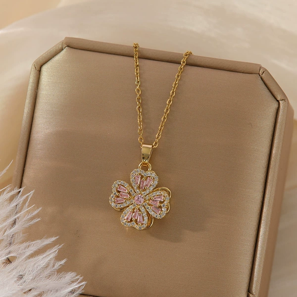 Rotating four-leaf gold-pink zirconium