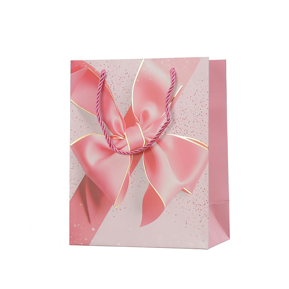 Bolsas de regalo de San Valentín bolsas de embalaje de arco bolsas de regalo de vacaciones Qixi papel cartón blanco estampado bolsas al por mayor