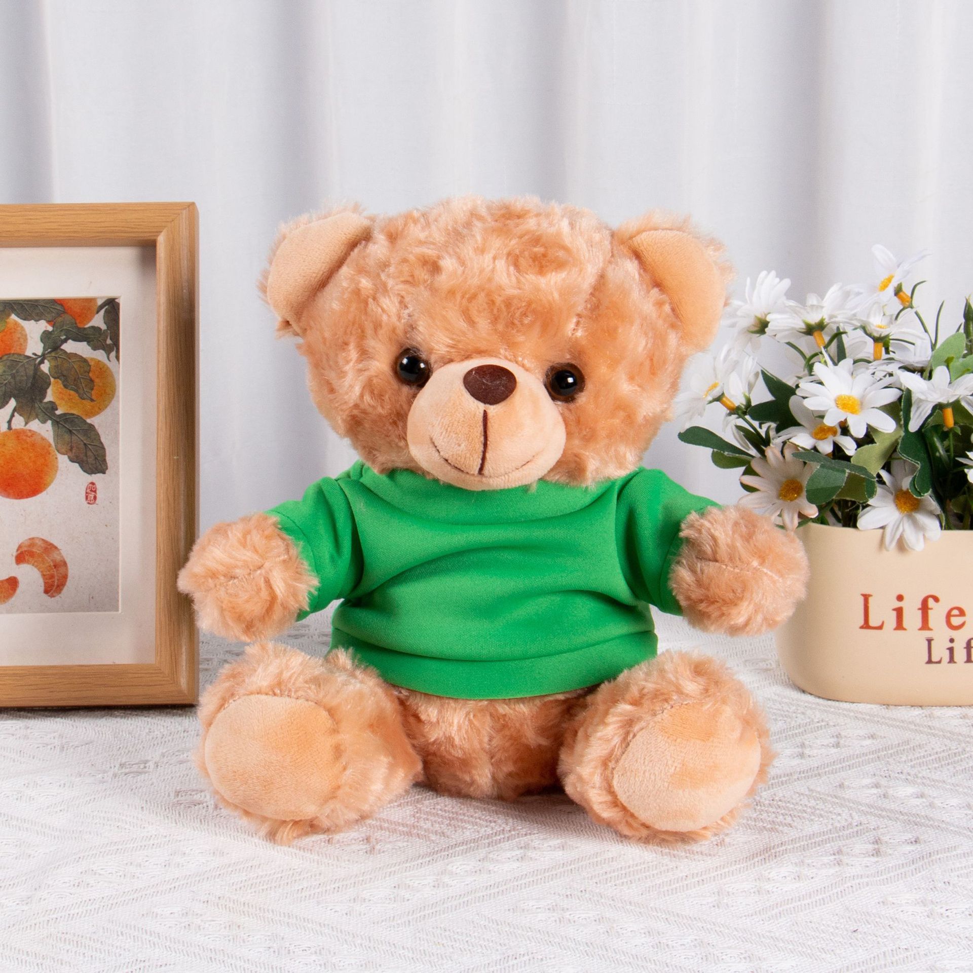 El oso marrón y el tijo verde
