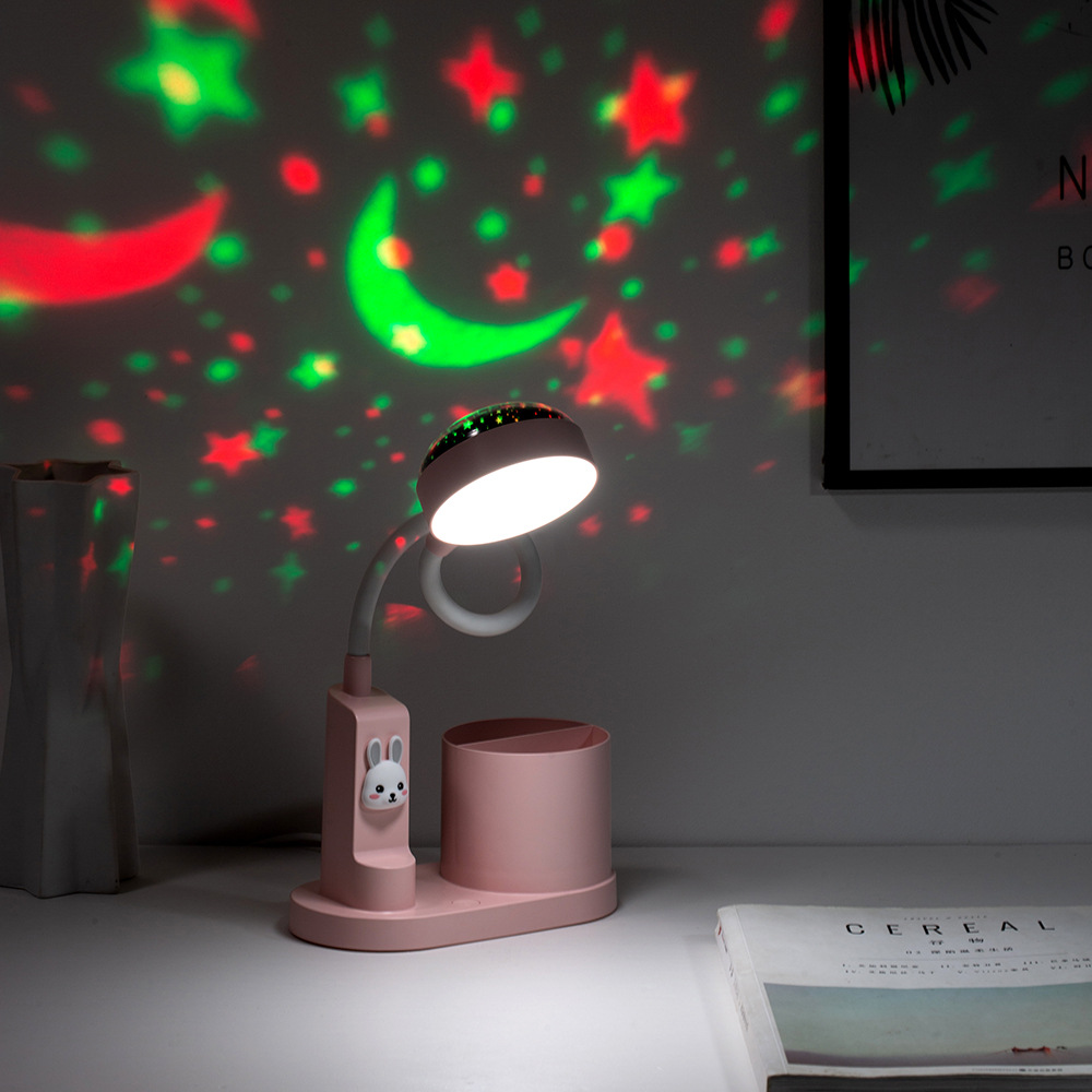 2022 nuevo creativo usb recargable lámpara de proyección LED estudiante dormitorio aprendizaje protección para los ojos fantasma pluma titular lámpara de escritorio
