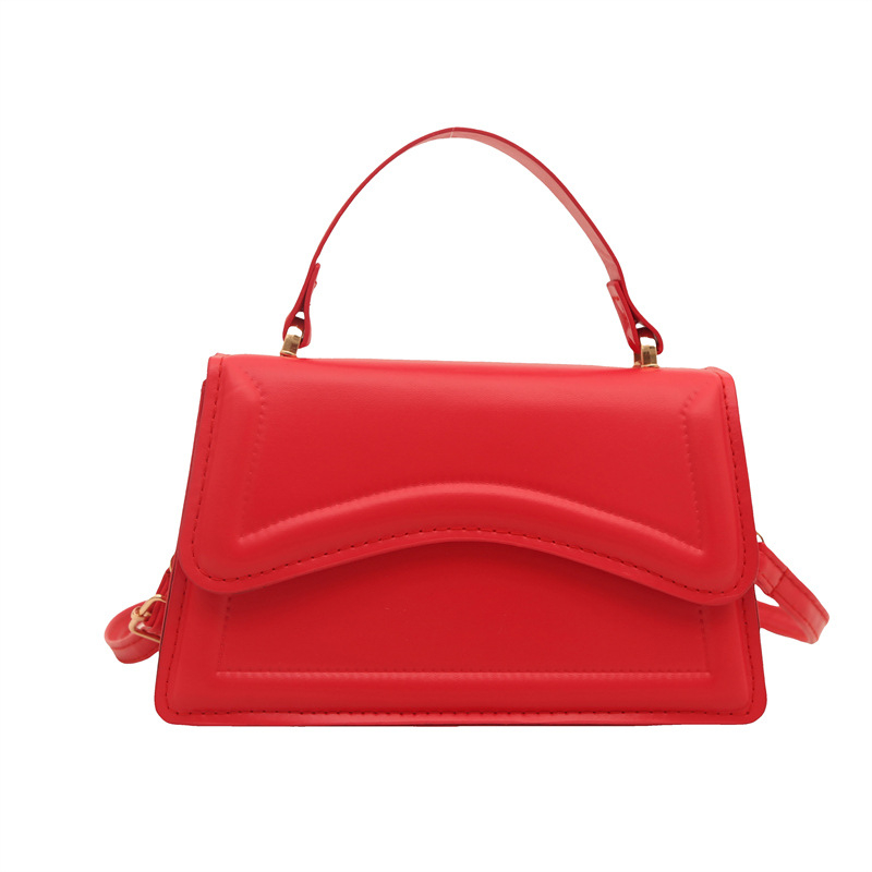 Texturas de moda en estilo de estilo de viaje ocio personalidad de primavera 2025 nuevo bolso de mano minimalista nicho bolso de mochila