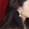 Universal earrings from pearl solar-powered, simple and elegant design