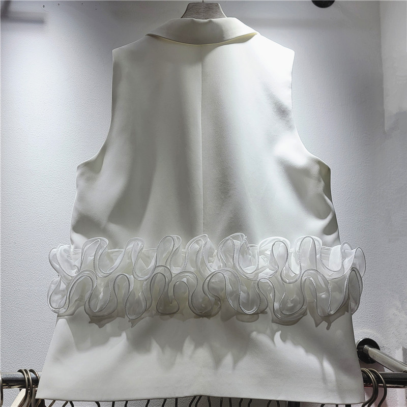 Trajes de moda europeos y estadounidenses chaleco de malla de diseño de malla de poliestirón personalidad suelta chaqueta de abrazadera de caballo para mujeres primavera y otoño nuevo