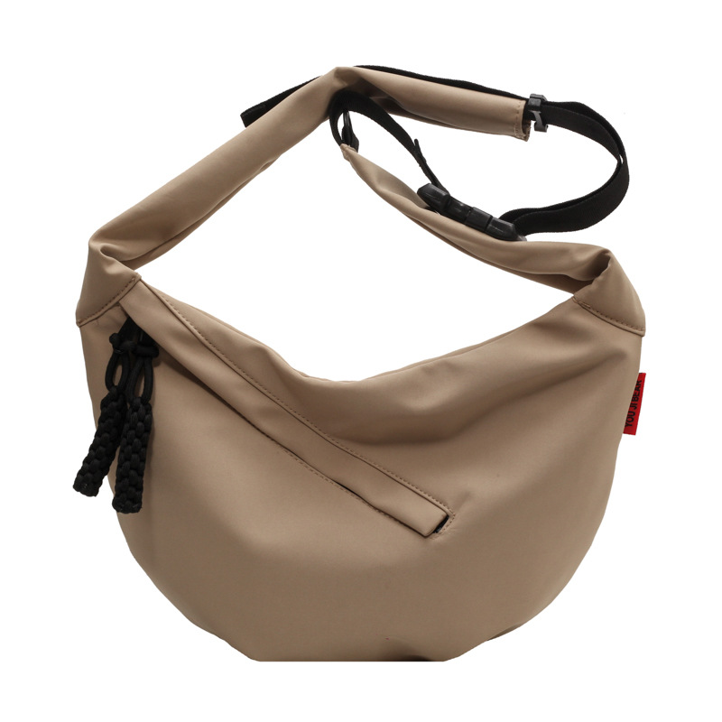 Bolsa de gran capacidad para las mujeres 2023 nueva bolsa de hombro casual estilo coreano color sólido bolsa de mensajero moda estudiante bolsa de nylon dumpling