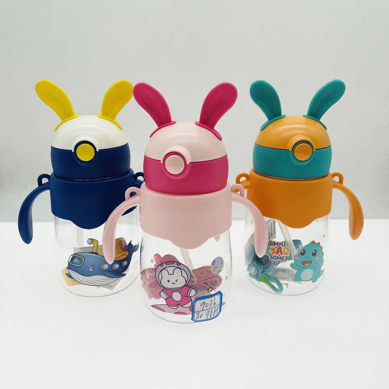Weilong 9012 espacio taza de agua de dibujos animados de impresión de plástico niños Orejas de conejo de aprendizaje taza de beber con mango taza de paja