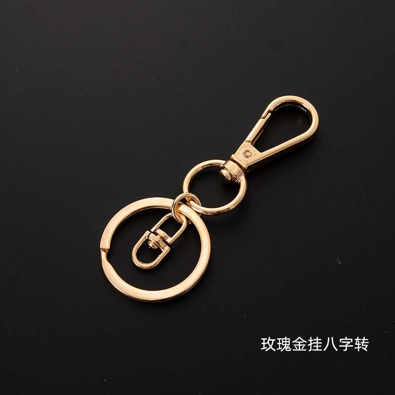 バラの金の犬のボタンのキーホルダーは金属のキーホルダーのチェーンの8字を掛けてdiyの金属のアクセサリの部品の掛け物の材料を掛けます。|undefined
