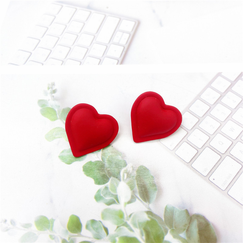 fashionable solid color heartshaped metal earrings wholesalepicture1