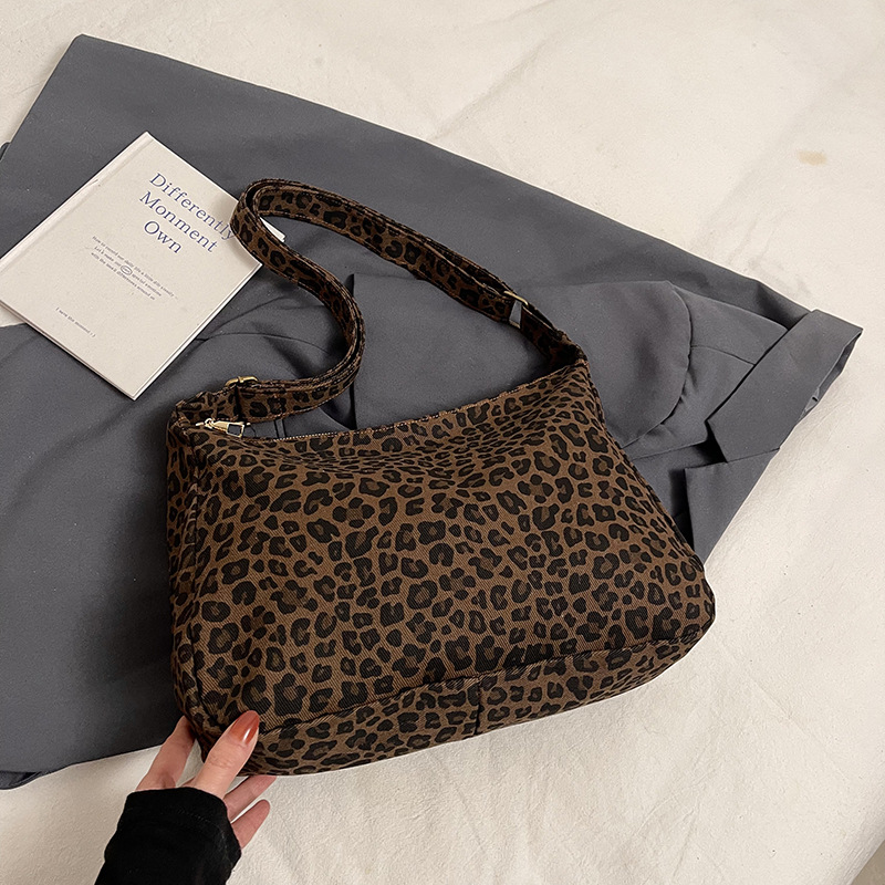 Bolso de gran capacidad de leopardo para mujeres otoño y invierno 2024 nueva moda bolso de hombro portátil de moda para trabajar mochila de viaje