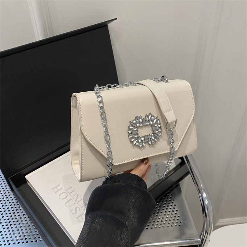 2024 invierno nuevo bolso de cadenas de diamantes retrógrado exquisito vestido plano para la cena pequeña bolsa cuadrada para mujeres