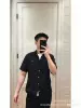 Black shirt, with short sleeve