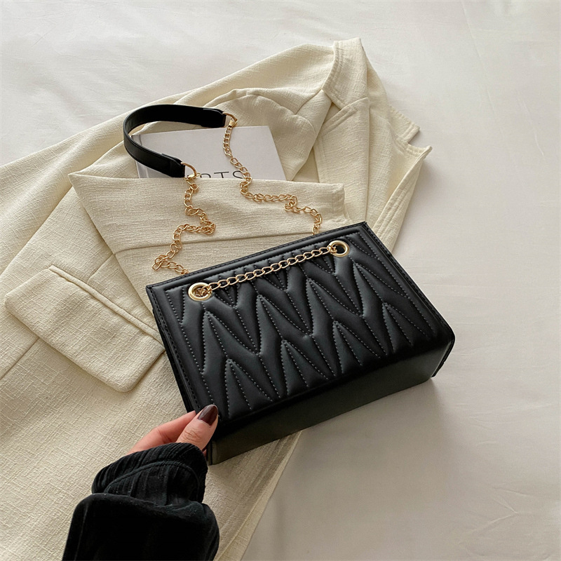 Bolsa de cadena de textura de alta calidad para mujer 2024 nueva moda rombo viajero de un solo hombro mensajero de nicho bolso cuadrado pequeño Tote