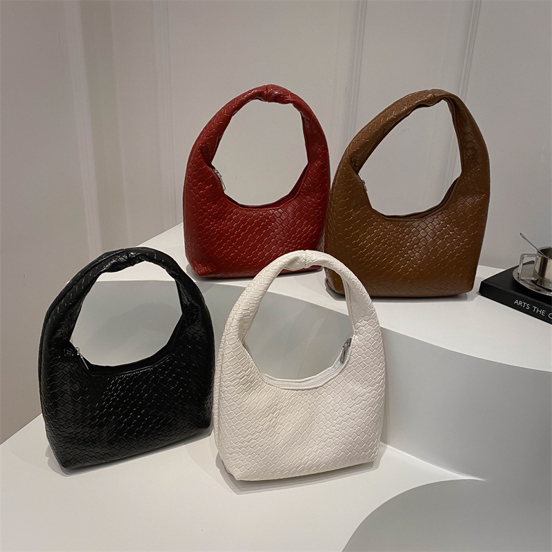 2025 moda popular trenzada simple bolso de viaje de nicho bolso de brazo bolso de hombro de gran capacidad