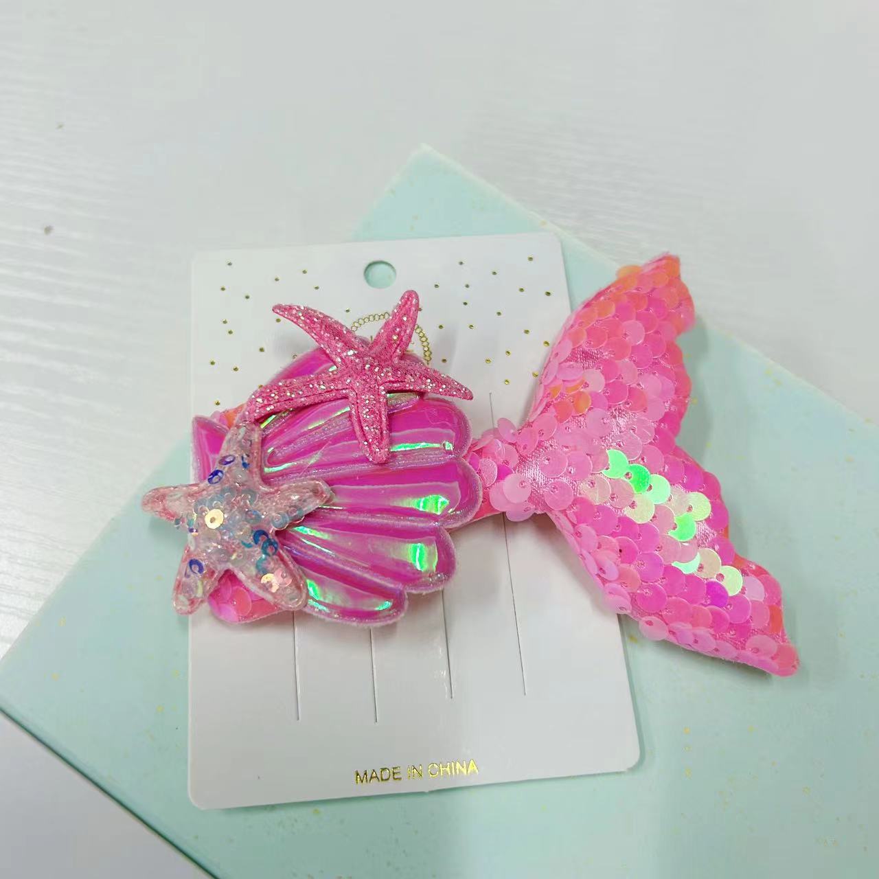 Nueva horquilla de cola de pescado lado brillante horquilla rota lentejuelas para niños show girls shell bangs clip