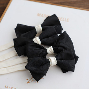 Factory in stock wholesale vintage black and white banquet party bow tie men's light luxury style contrast color dark pattern bow