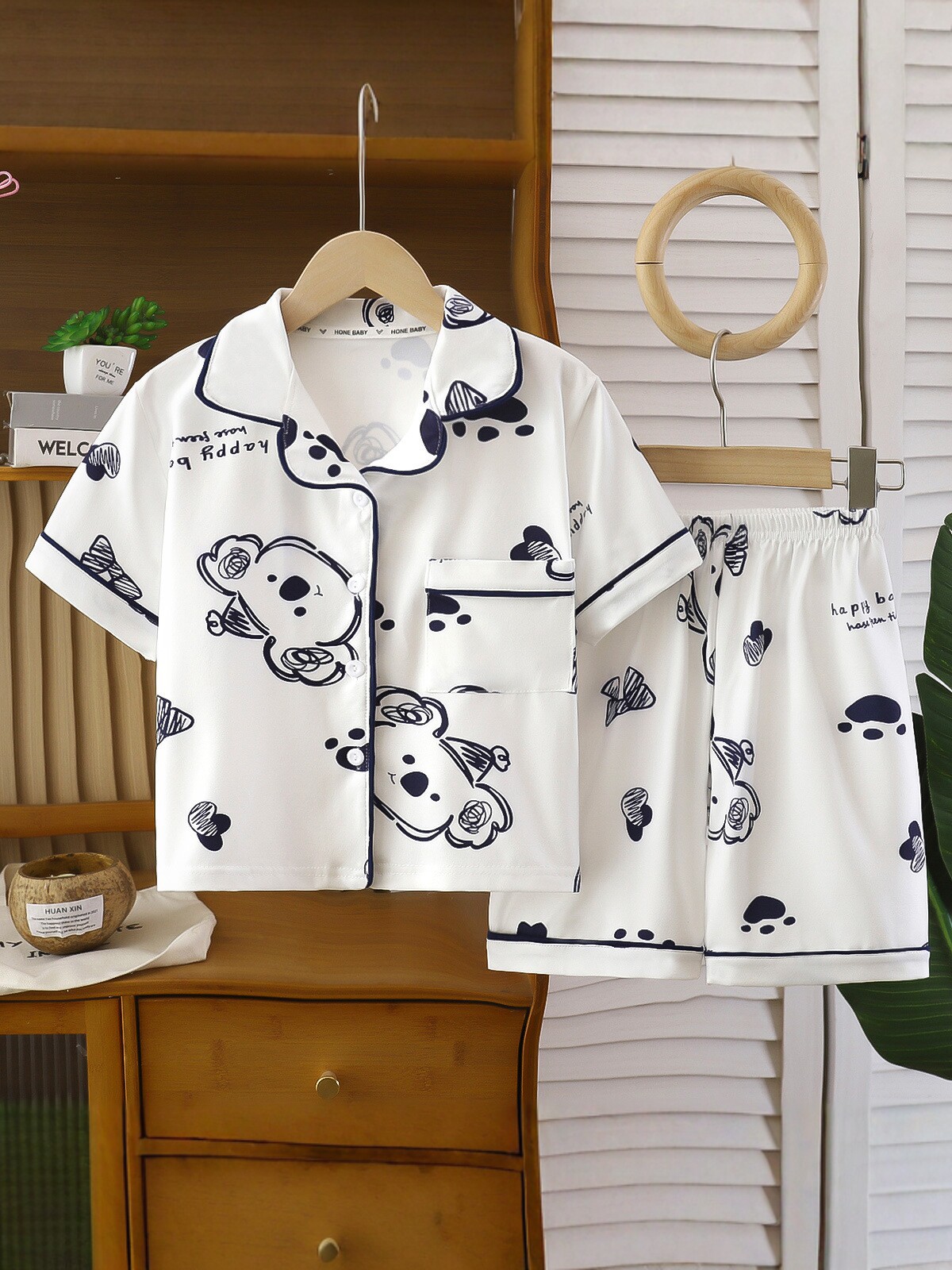 Niños de verano nuevo dibujos animados mangas cortas ropa de vestir para el hogar, hombres y mujeres con solapa ropa de aire acondicionado, pijamas delgados impresión