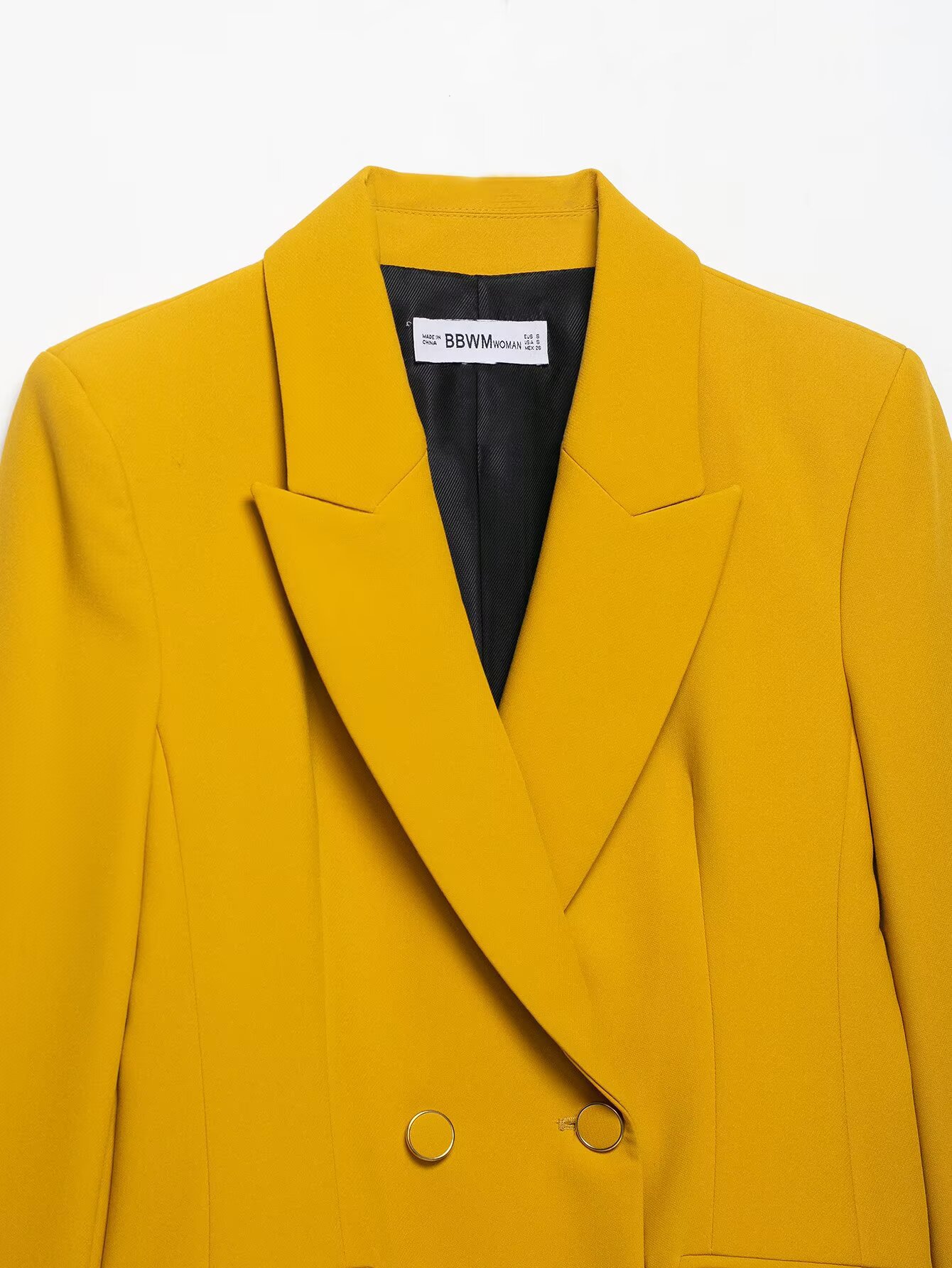 Dames broekpak met blazer met schoudervullingen en hoge taille_voghion.com